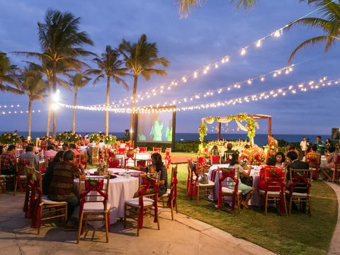 Night reception under string lights from the CITTA heritage archive